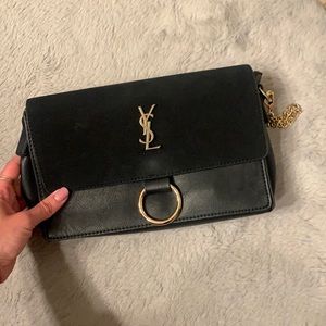 Black purse with gold logo
